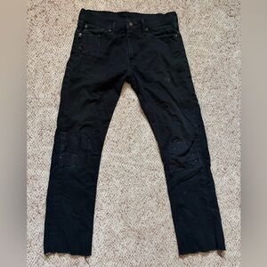 Black Patched & Destructed Levi’s 513